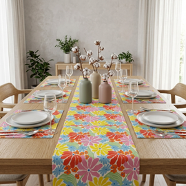 Bright multicoloured floral table runner with matching placemats.