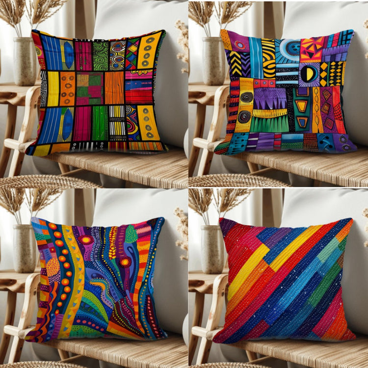 Four multicoloured geometric cushion covers displayed on wooden chairs.