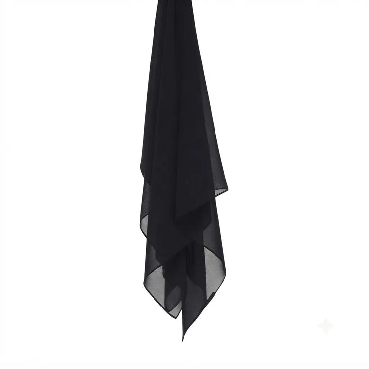 Black chiffon stole hanging vertically to show its light fabric.