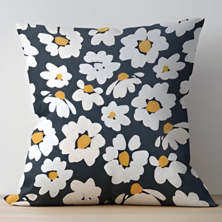 Charcoal cushion cover with large white flowers and yellow centres.