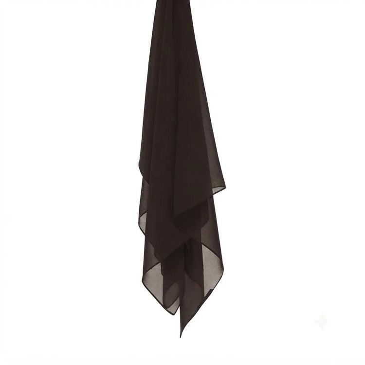 Brown chiffon stole hanging vertically to show its light fabric.