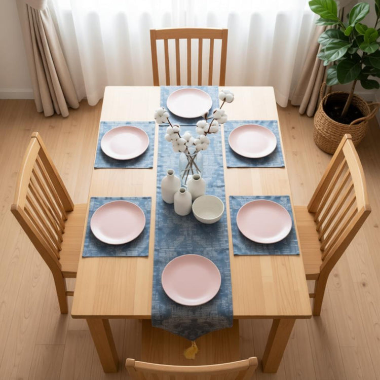 Light blue damask table runner with matching placemats.