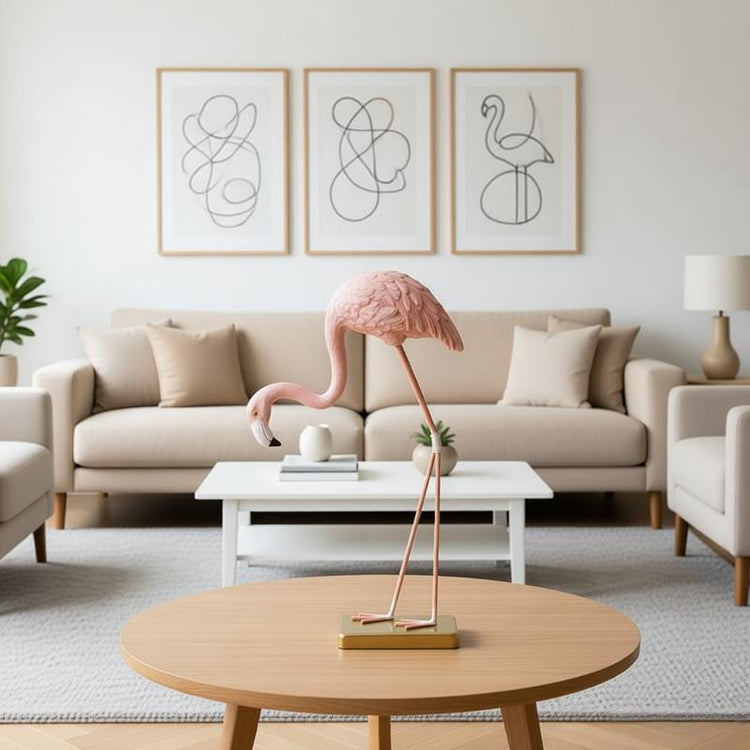 Pink flamingo ornament on a gold-coloured stand in a living-room setting.