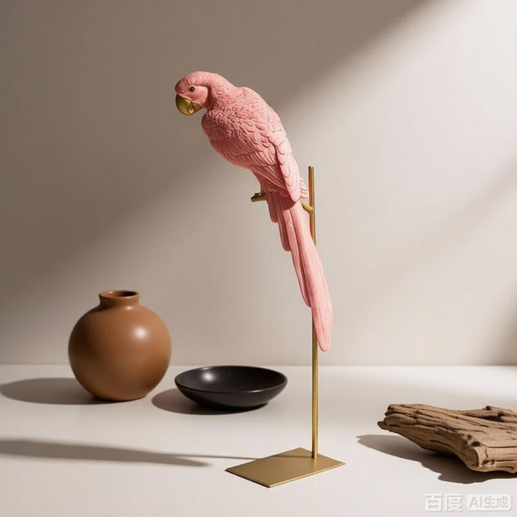 Pink parrot figurine perched on a slim gold-coloured stand.