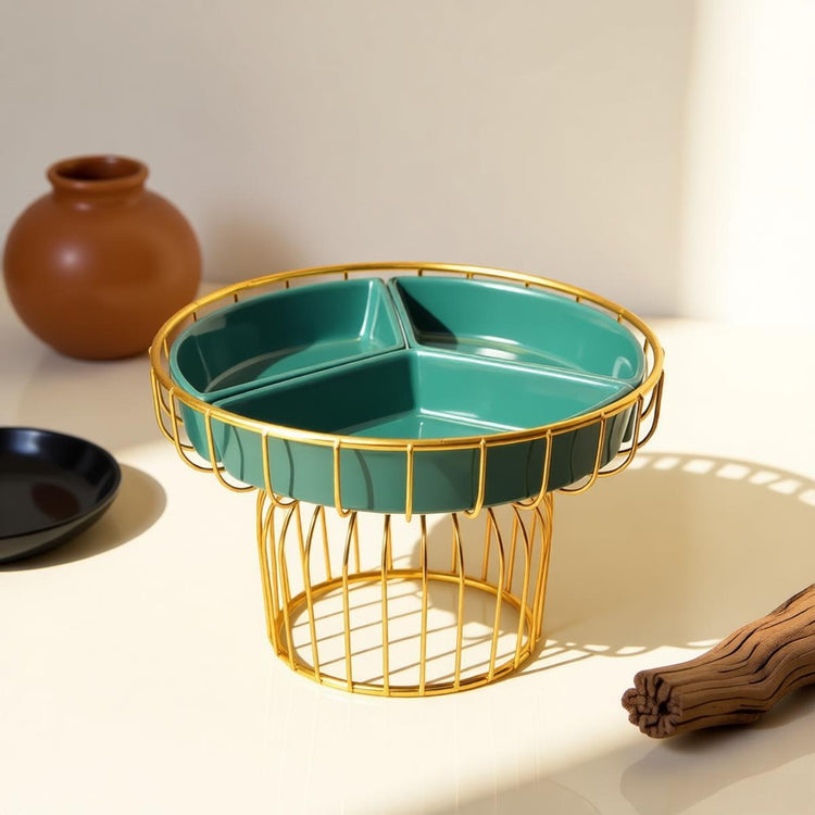 Green divided snack tray supported by a gold-coloured wire pedestal.
