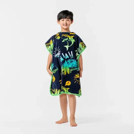 Child wearing a dark hooded poncho with colourful sea-life prints.
