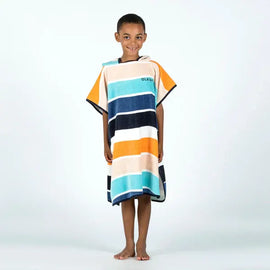 Child wearing a hooded towel poncho with navy, white, turquoise and orange stripes.