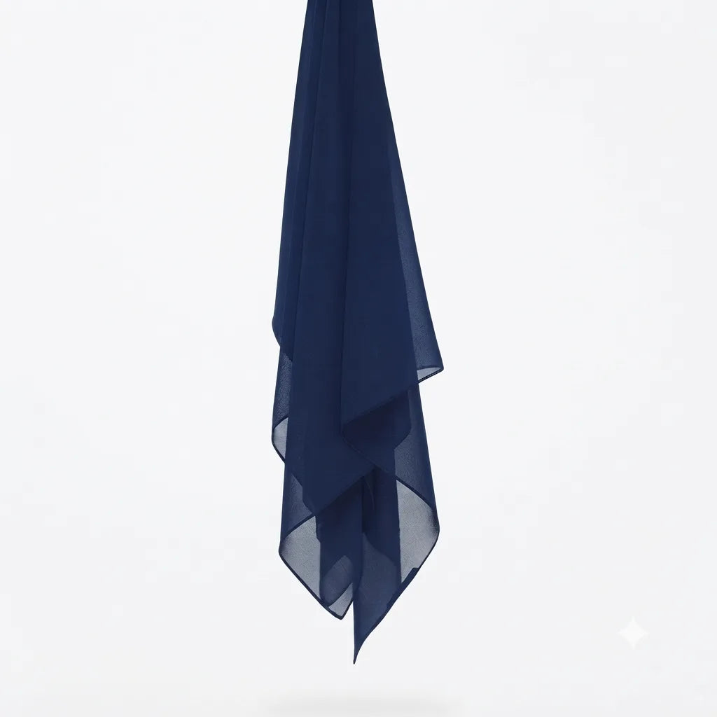 Dark navy chiffon stole hanging vertically to show its light fabric.