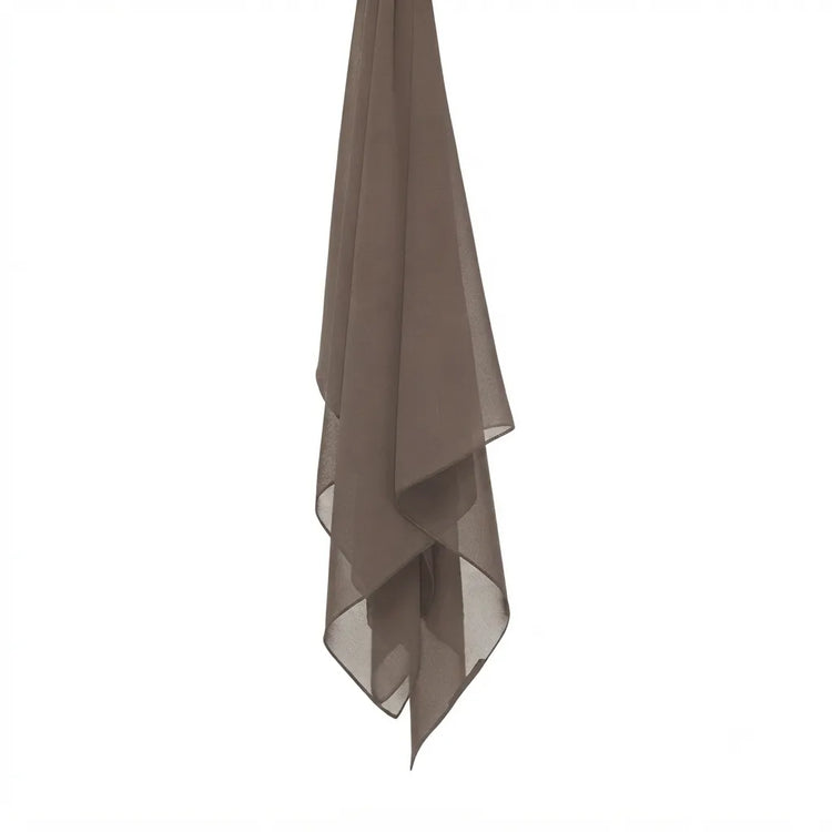 Taupe chiffon stole hanging vertically to show its light fabric.