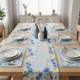Pale blue and cream floral table runner with matching placemats.