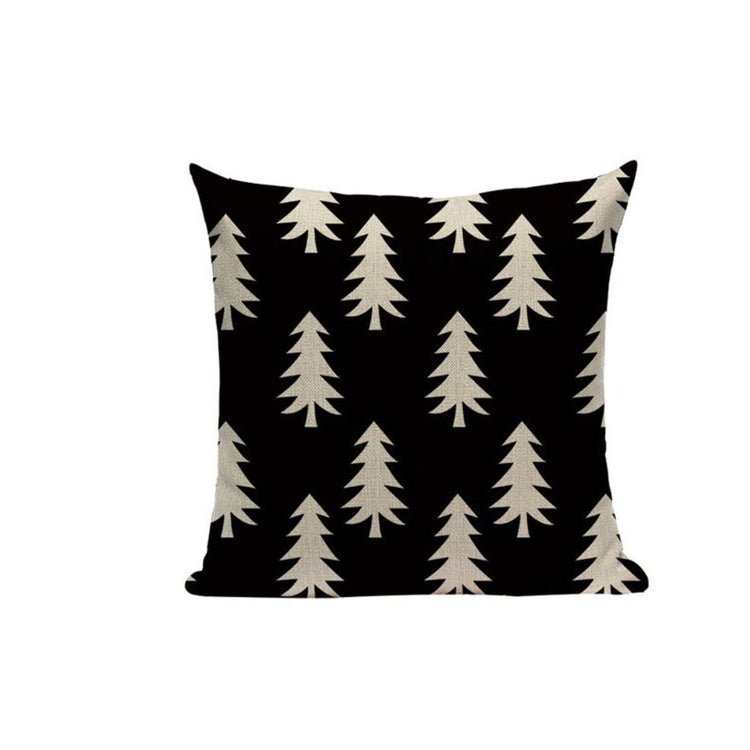 Black cushion cover with rows of cream fir trees.