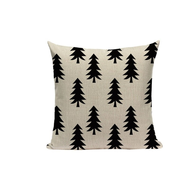 Cream cushion cover with rows of black fir trees.