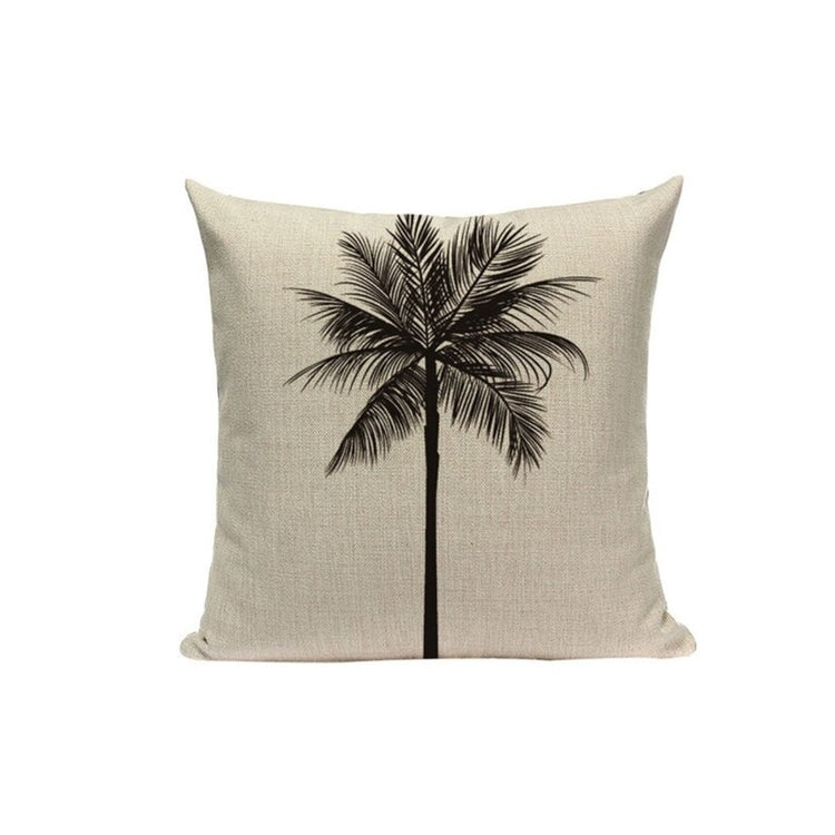 Cream cushion cover with a tall black palm tree illustration.