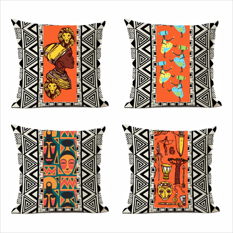 Four black and white geometric cushion covers with colourful central illustrated panels.