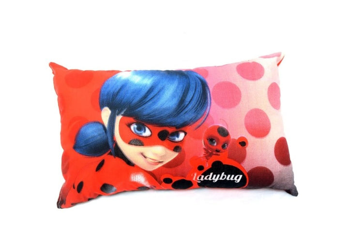 Red children's pillow cover with a blue-haired cartoon superhero print.