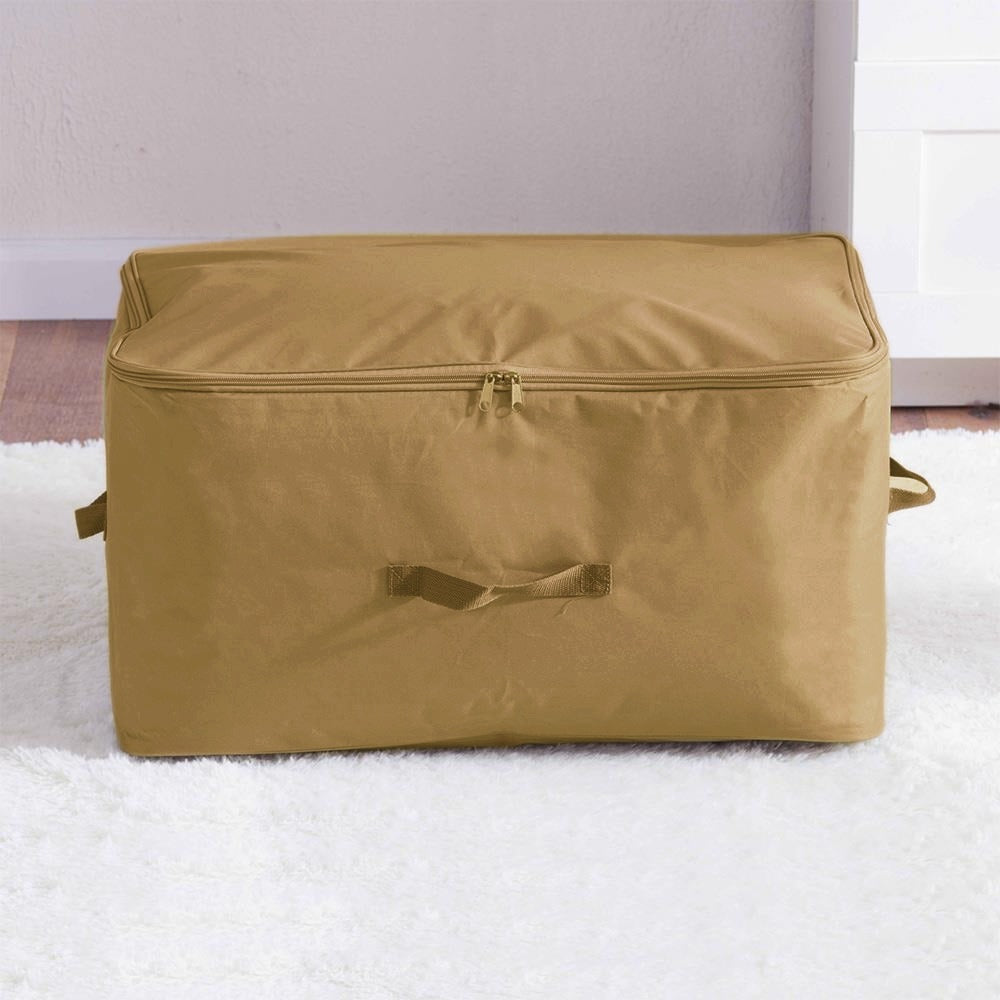 Mustard zippered fabric storage bag with side handles.