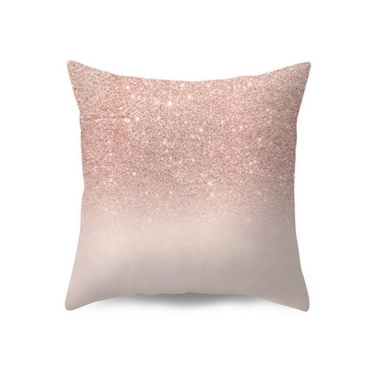 Cushion cover with a pink glitter-style print fading into cream.