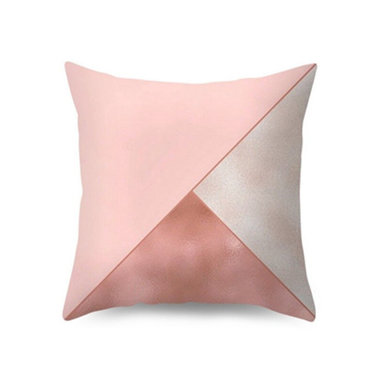 Cushion cover with blush pink, cream and rose-toned geometric panels.