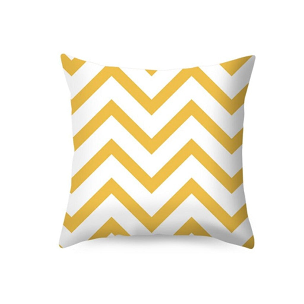 White cushion cover with broad yellow chevrons.