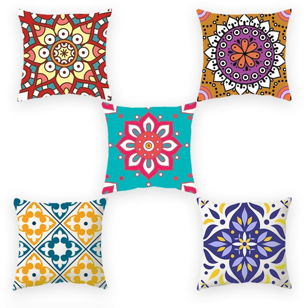 Five colourful cushion covers with mandala and geometric floral designs.
