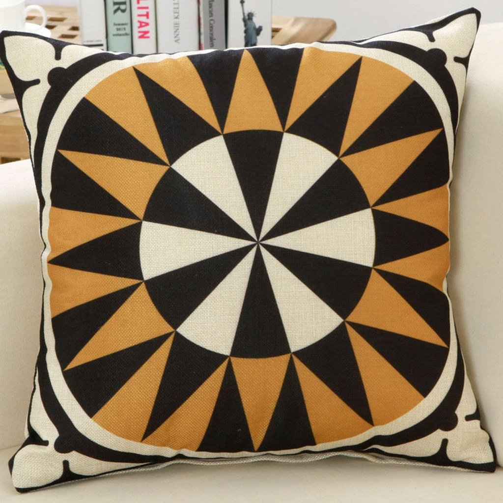 Black, cream and gold cushion cover with a circular starburst pattern.