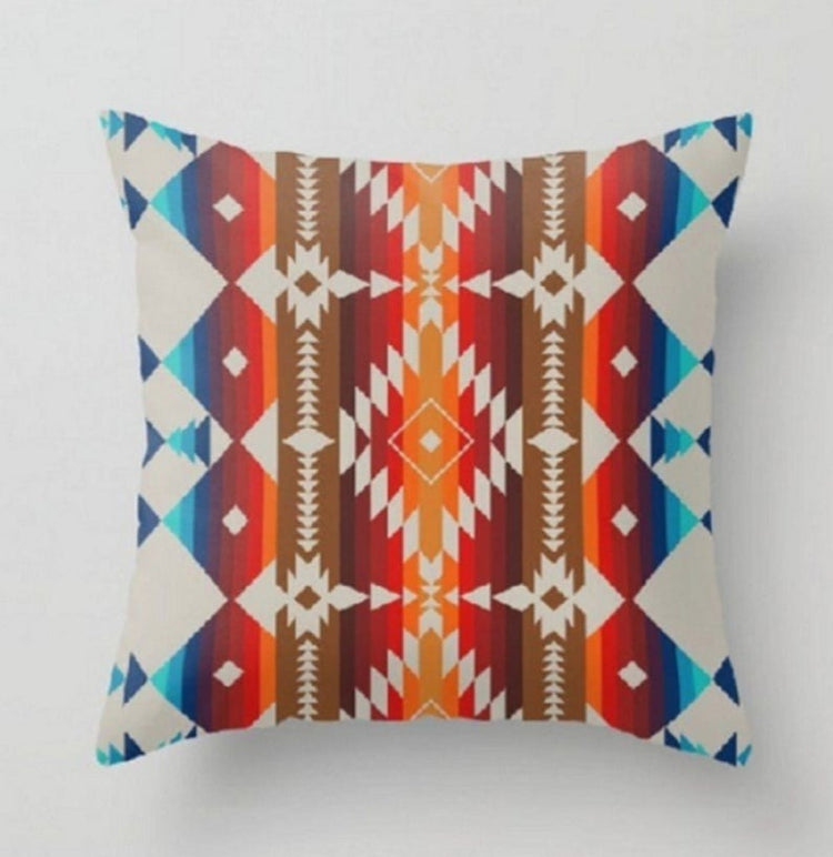 Cushion cover with red, cream and blue geometric striped motifs.