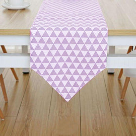 Lavender and white triangle-pattern table runner.