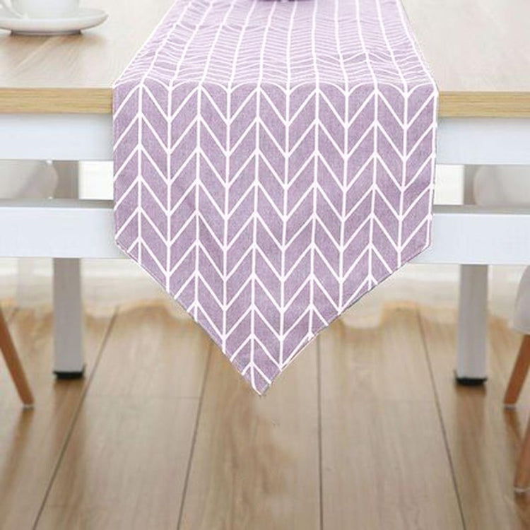 Lavender table runner with white chevron lines.