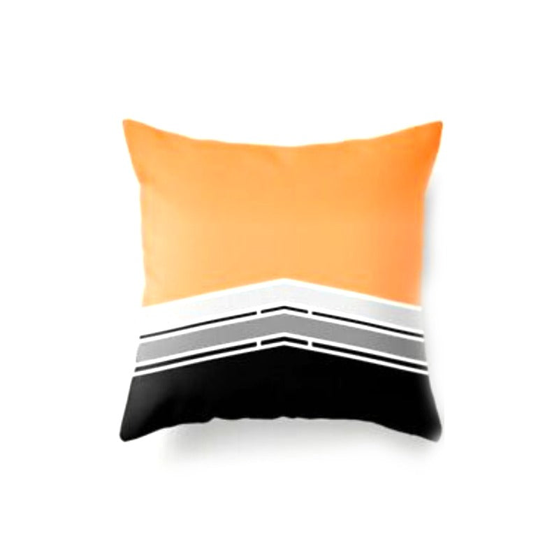 Orange cushion cover with white, grey and black bands across the bottom.