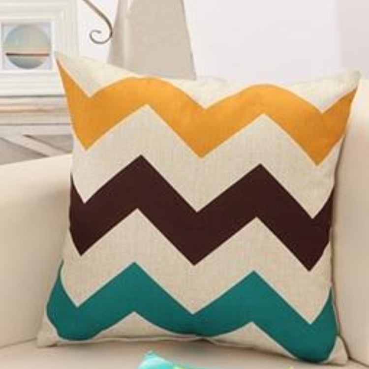 Cushion cover with wide mustard, brown, teal and cream zigzag stripes.