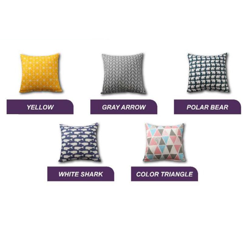 Five cushion covers with yellow, grey, black and multicoloured geometric prints.