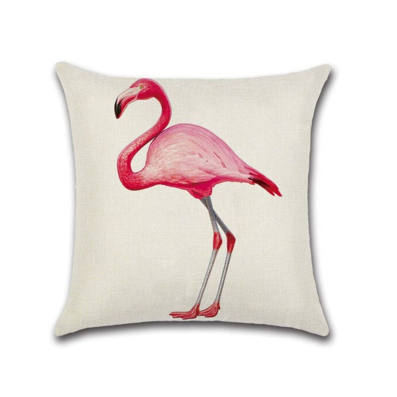 Cream cushion cover with a standing pink flamingo.