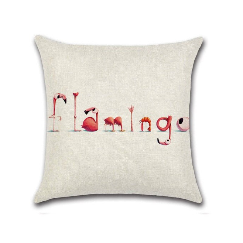 Cream cushion cover with pink Flamingo lettering.