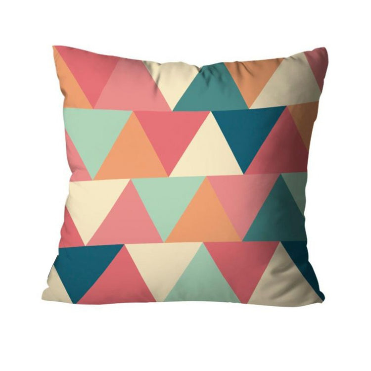 Cushion cover with pink, mint, orange and teal triangles.