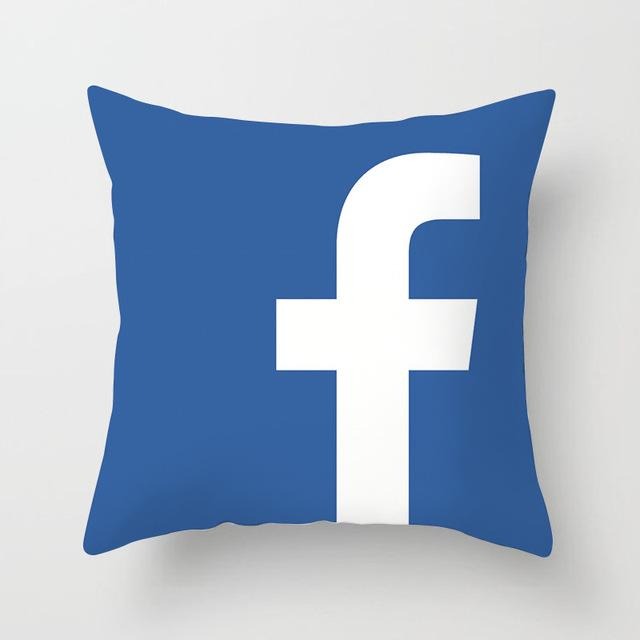 Blue cushion cover with a large white Facebook f logo.