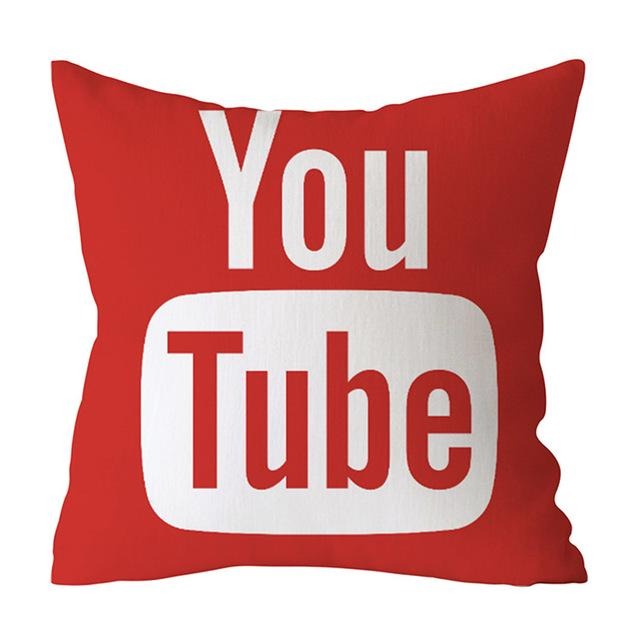 Red cushion cover with white YouTube lettering.