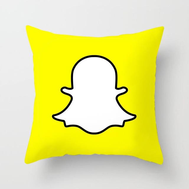 Yellow cushion cover with a white Snapchat ghost logo.