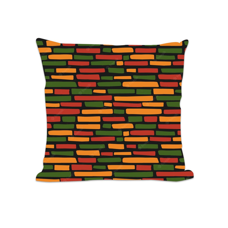 Black cushion cover with rows of small orange, green and yellow rectangles.