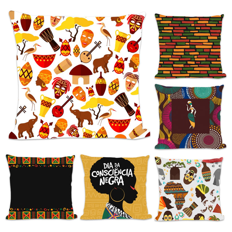Six cushion covers with colourful figures, masks, drums and geometric designs.