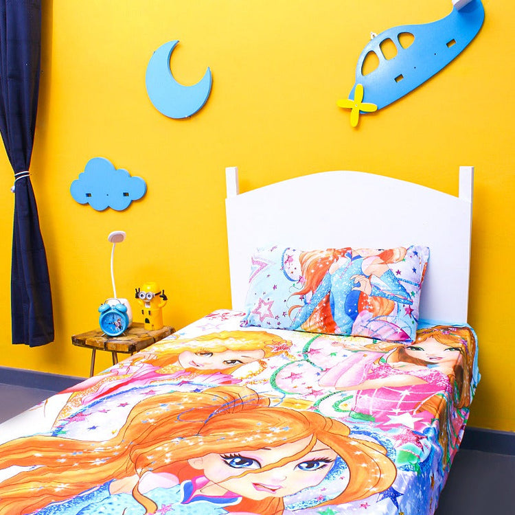 Colourful cartoon-girl-print children's bedsheet on a single bed.