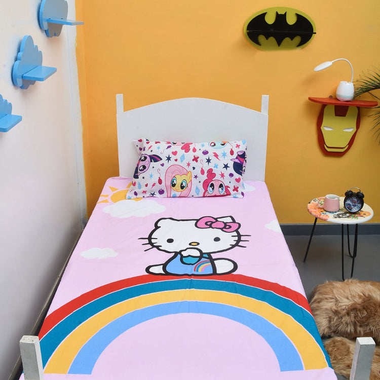Pink children's bedsheet with a cartoon cat and rainbow design.