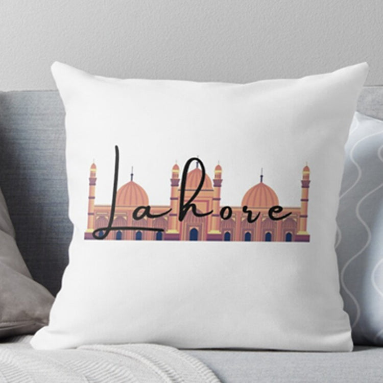 White cushion cover with Lahore lettering and an illustrated city skyline.