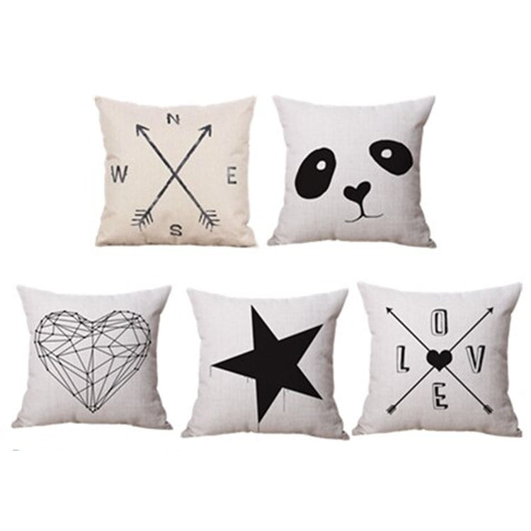 Five cream cushion covers with black star, heart, panda and arrow designs.