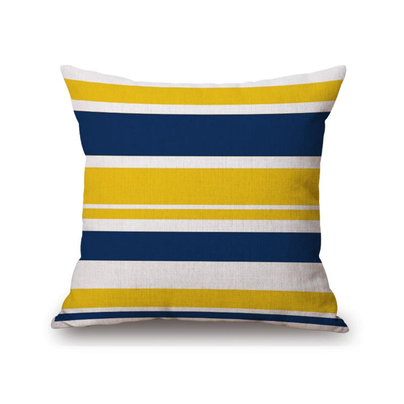 Cushion cover with horizontal navy, yellow and white stripes.