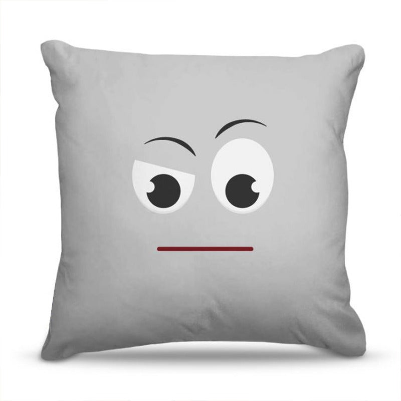 Grey cushion cover with a cartoon face looking sideways.