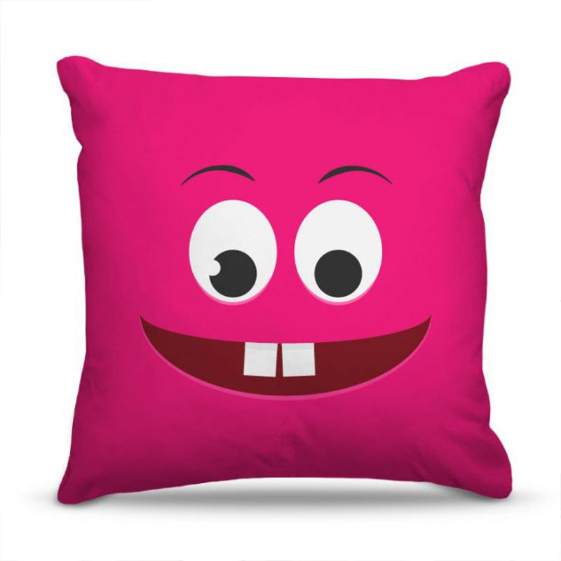 Pink cushion cover with a smiling cartoon face and two square teeth.