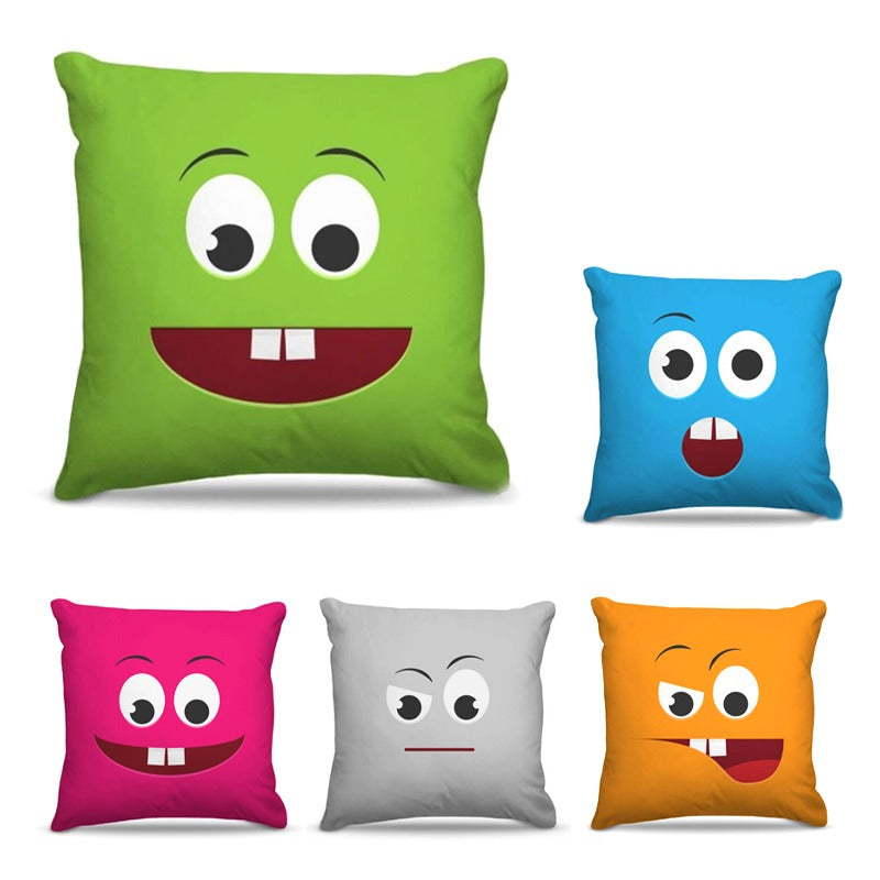 Five brightly coloured cushion covers with different cartoon faces.