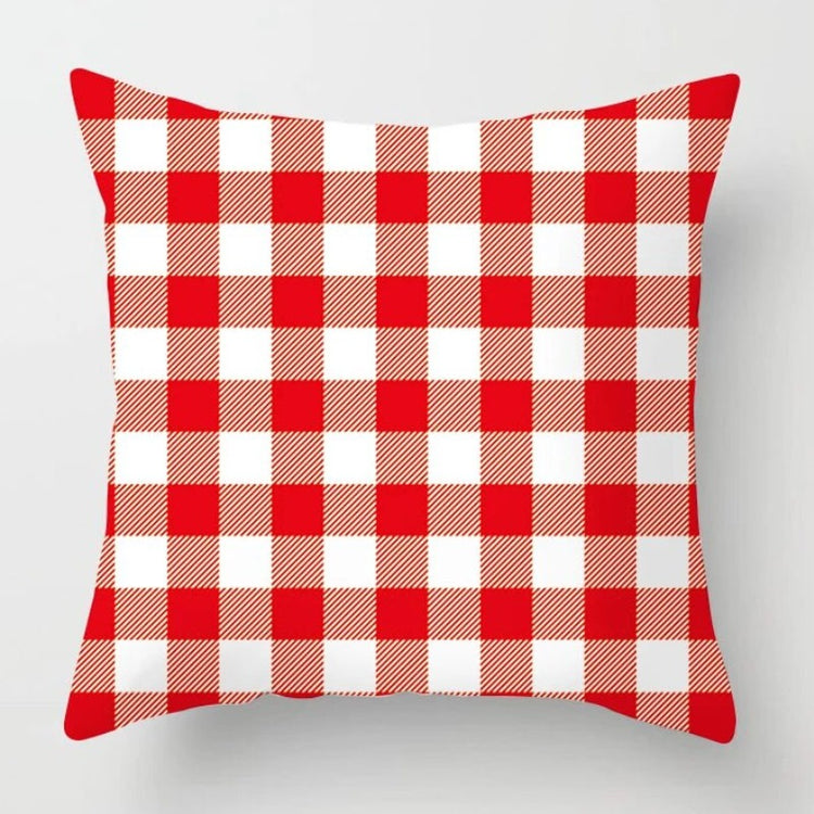Cushion cover with a red and white gingham check pattern.