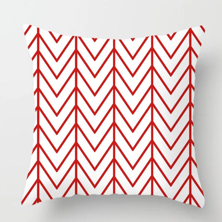 White cushion cover with thin red chevron lines.