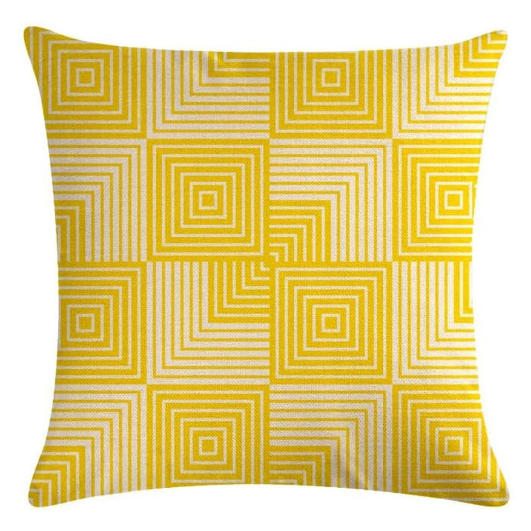 Yellow cushion cover with white concentric squares and fine striped blocks.